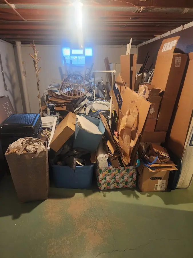 Roll-off dumpster container at job site for 2 Yard Dumpster Rental in Lavon